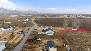 Aerial view featuring a rural view and a mountain view