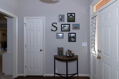 Entryway with cedar lined coat closet