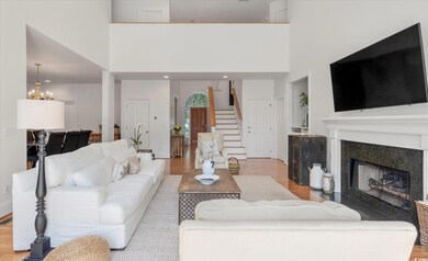Living room featuring light hardwood / wood-style 