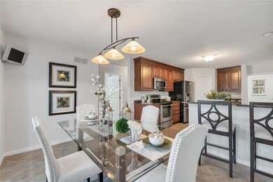 Breakfast room and kitchen with tile floors