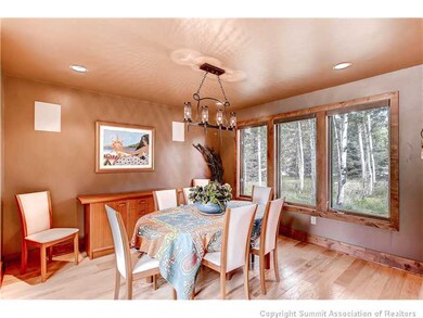 Dining Room. Enjoy a private intimate dinner or expand to a large gathering with family and friends.  Separated by a wall, the kitchen access is open for easy flow to serve or gather in both areas.