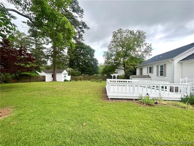 View of yard with a deck