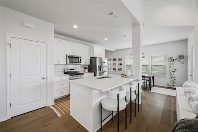 Kitchen featuring appliances with stainless steel