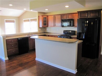 Beautiful maple cabinets and center island with ro