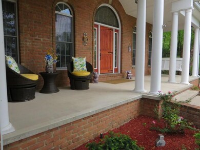Enjoy this beautiful front covered porch