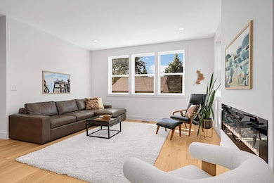 Living room space looks out to the backyard