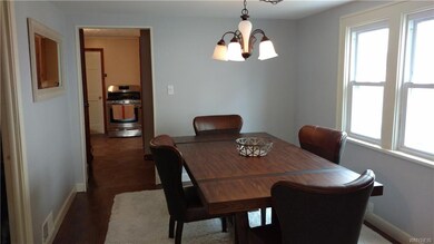 Enjoy your meals in this spacious dining room.