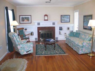 Cozy fire place, built in book shelves, orig hardw