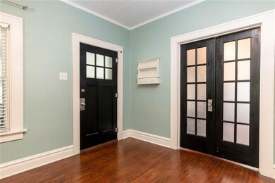 Bedroom or office space behind the French doors