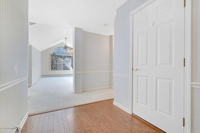 WOOD FLOOR IN FOYER
