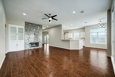 This living room, flooded with natural light, is more than just a place to gather; it's a canvas for your memories and moments, where laughter, conversations, and relaxation harmonize in perfect balance.