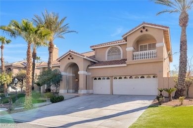 Mediterranean / spanish home featuring a tile roof