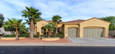 Front Of Home & 3 Car Garage