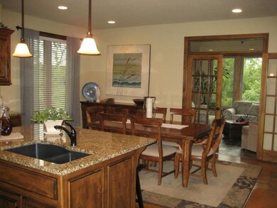 ...that opens into the large open kitchen w/granit