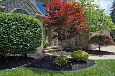Pristine landscaping with brick front faade and co