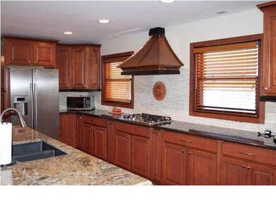 VIEW OF UPGRADED KITCHEN WITH STANLESS APPLIANCES/