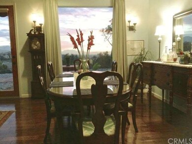 Formal dining room with big picturesque window for