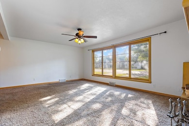 Great living room space with a flood of natural light coming through the windows.