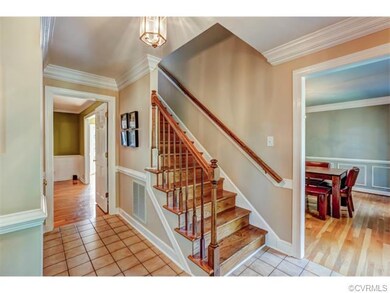 The Foyer offers tile floors, hardwood staircase, 