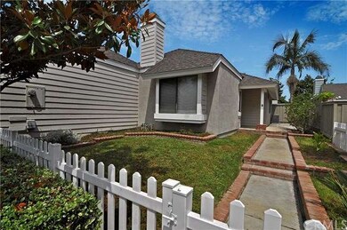 Step past the white picket fence to your own front