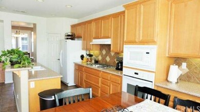 Granite counter tops, beautiful tile backsplash, b