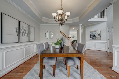 An elegant dining room showcasing high ceilings wi