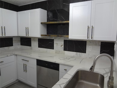 Another view of pretty kitchen.