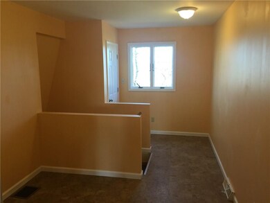 Foyer: At the top of the stairs to the apartment, 