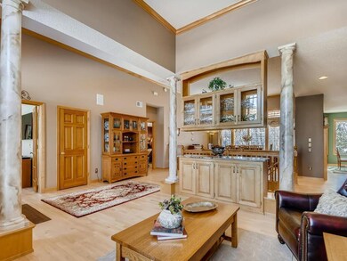 Crown molding, grand pillars, custom built-ins sep