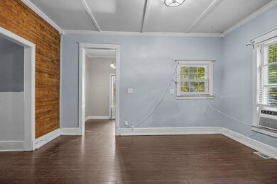 Great room with hand wood floors additional air unit to keep cool on main level.