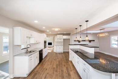 White Cabinets. New Pendent Lights.