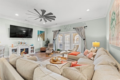 Living room featuring hardwood / wood-style floori