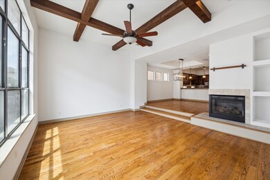 Note dual fireplace, built ins and ideal step down