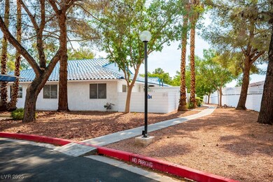 View of home's exterior with a tiled roof and stucco siding