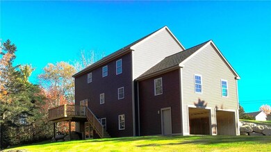 Rear view of house - great walkout...