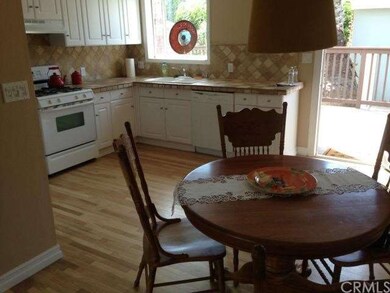bright kitchen with tile counter tops
