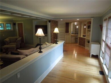 Living room looking from front entry towards kitch