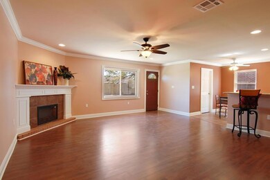OPEN FLOOR PLAN, CORNER ELEC. FIREPLACE, CROWN MOL