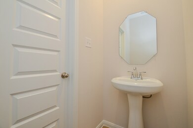 This cute, efficient half-bath, perfect for guests
