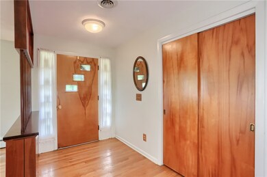 Step in and be drawn to the original hardwood flooring that graces the main level.