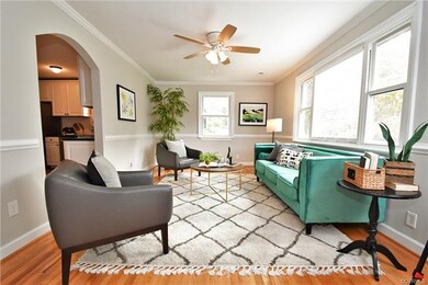 Arched Entry Ways from the Foyer to the Living Room and Living Room to the Kitchen
