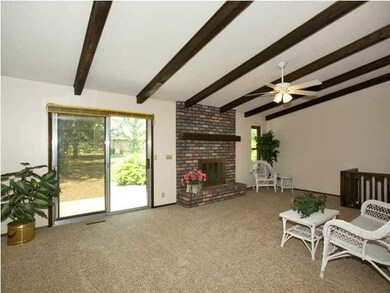 Living room view with doors leading out to New Pat