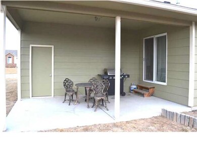 Very comfortable covered patio. Enter from dinning