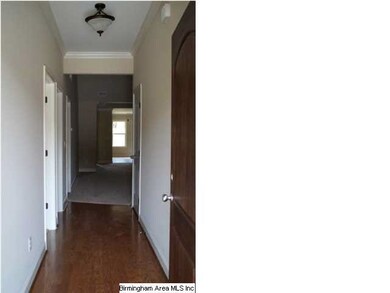 Foyer with hardwood floors