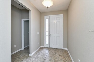 Foyer Area. Note lovely tile that is everywhere bu