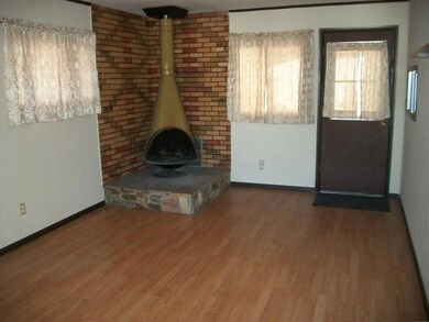 FAMILY ROOM WITH WOODBURNING STOVE