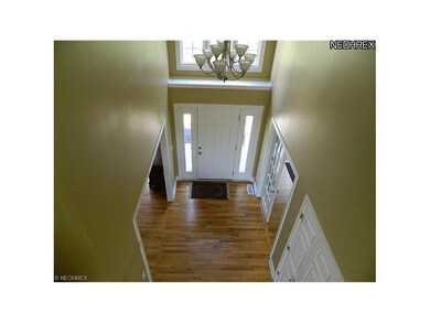 View of 2-Story Foyer from Bridge*Hardwood Floor &