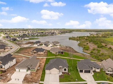 1404 Kintyre Ct, Raymore, MO 64083 - photo 4