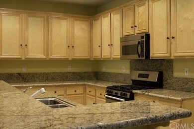 Large Open Kitchen Layout with Recessed Lighting a