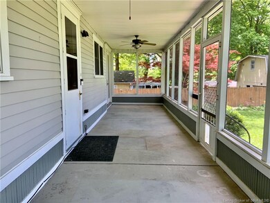 Screened porch spans entire back of house.